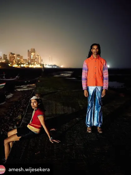 Another dynamic shot from the Amesh editorial, with the Mumbai skyline in the background. My grooming work ensures the models look sharp and defined, even in a complex, low-light environment.