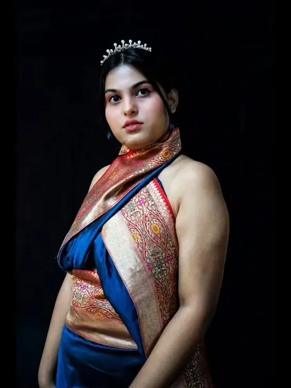 Let's get creative with your ethnic wear. I transformed a classic Banarasi saree into a modern, no-sew halter neck draped dress, accessorized with a simple tiara for a touch of fantasycore. This is how I approach fusion styling to create unique outfits.