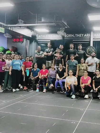 The heart and soul of my classes. Each photo captures a unique moment with my incredible community after a sweaty, joyful session. This is our shared victory lap.