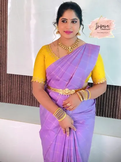 A soft and subtle makeup look for this guest. The light purple saree is paired with makeup that gives her a fresh and elegant appearance.