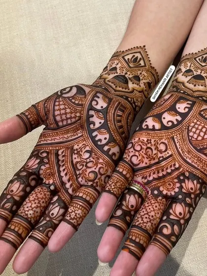 A different perspective of the elephant and lotus design, showing the clean and symmetrical application.