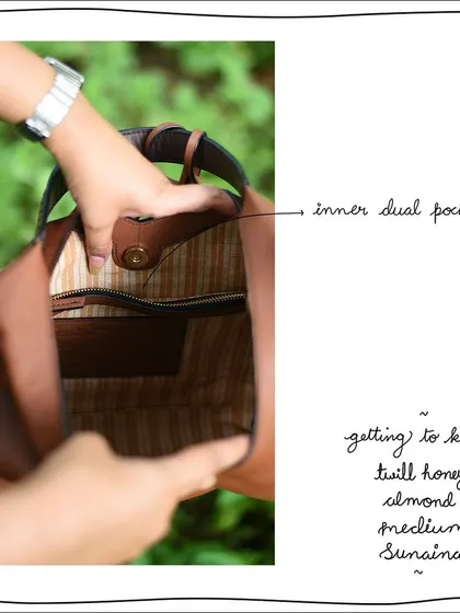 The inner dual pocket of the Twill Honey Almond Medium Sunaina. The striped cotton lining is a signature feature of our bags, adding a touch of brightness to the interior.