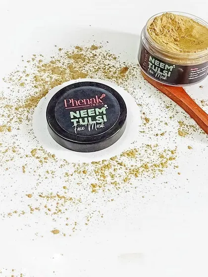 This is my Neem Tulsi Face Mask, a powder formula you can mix with water or yogurt. It’s a unique blend of neem, tulsi, and Fuller's earth to brighten, heal, and detoxify oily, acne-prone skin.