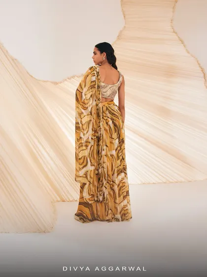 The back of the Verity co-ord set, showcasing the one-shoulder design and the full drape of the skirt.