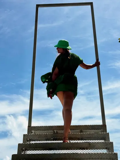 A dramatic shot on the 'stairway to heaven' installation at Secret Bay, with the wind catching my dress perfectly.