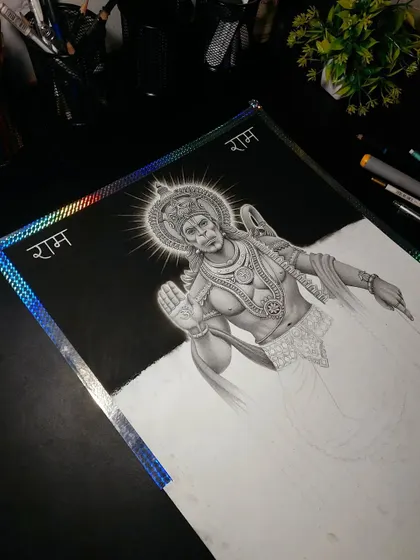 The Hanuman ji drawing with the background shading in progress. This creates a dramatic effect for the final piece.