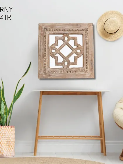 This square wooden mirror with its geometric carved pattern adds a touch of global-inspired charm. The natural, whitewashed finish highlights the texture of the mango wood, creating a light and airy feel that works beautifully in bohemian and coastal-style homes.