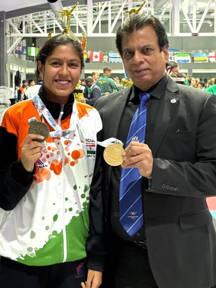 With Ms. Alisha, another of our bronze medal winners at the 21st AKF Asian Senior Karate Championship. We announced a cash award of ₹1,51,000 to honor her historic performance in the -55 kg Kumite category.
