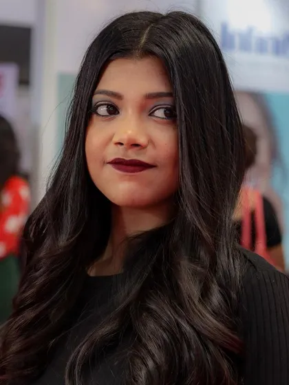 Learning to create looks that are both beautiful in person and striking on camera is a key part of our training.