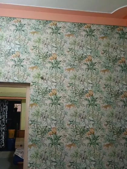 A whimsical jungle-themed wallpaper featuring tigers and flowers. The playful and detailed pattern is great for a study or a creative space, adding a touch of adventure.