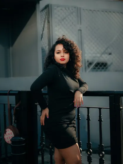 A duplicate of image 412, this moody portrait captures a sophisticated and slightly edgy fashion look on the streets of Bangalore.