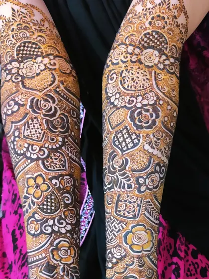 This design uses negative space to create a striking contrast, making the floral and geometric patterns stand out.