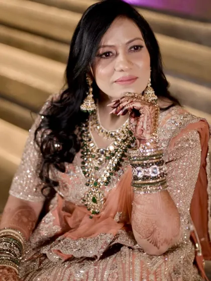 My stunning 25th-anniversary bride. It's proof that true love never fades, and neither should your glow. Her makeup was elegant and sophisticated, perfect for the celebration.
