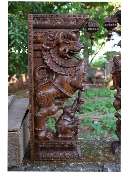 The Yaali bracket seen from a slightly different perspective, highlighting the depth of the relief and the richness of the wax brown finish.