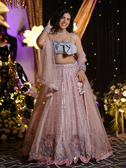 A full view of this dreamy pastel lehenga. Notice how the intricate embroidery and sequin work catch the light. I focus on finding pieces with beautiful details that make you feel like you’re wearing a work of art.