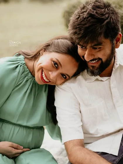 A beautiful close up showing her radiant smile as she leans on her partner. These are the happy, relaxed moments that make the best memories.