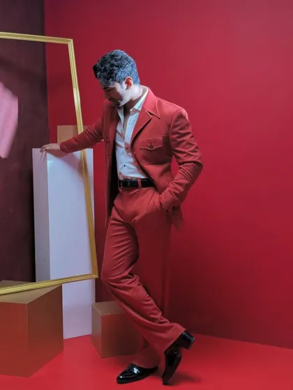 Style isn't just for traditional events. This bold, custom-tailored red suit, seen here on actor Taaha Shah, showcases our expertise in creating sharp, contemporary Western wear for any high-profile occasion.
