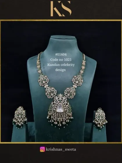 This version of our celebrity Kundan set features a classic oxidized finish with green beads, offering a more antique and understated look.