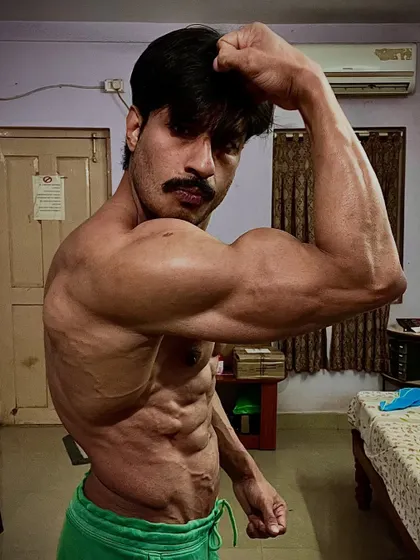 Another shot from my shredded phase, showing intense vascularity and a lean, hard physique.