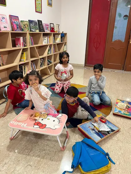 Snack time and puzzles during a break at our spring camp. It's a time for kids to relax and socialize.