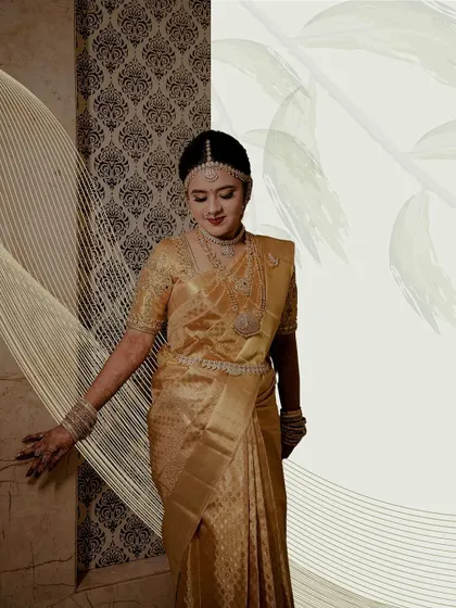 The same artistic portrait as image 33, presented cleanly to emphasize the bride's elegance and the beautiful texture of the wall behind her.