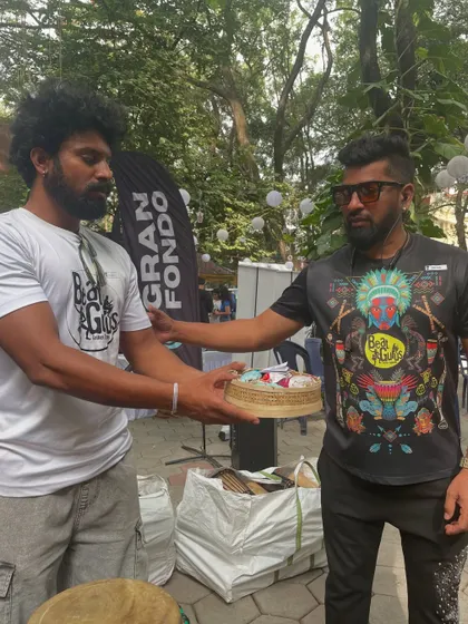 Another lucky winner receiving a hamper from The Whole Truth Foods at the Garage Sale.