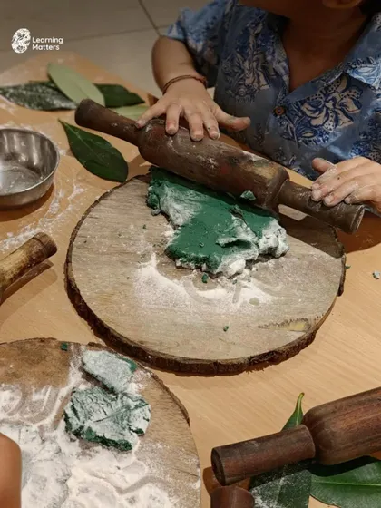 Using a rolling pin with playdough helps develop bilateral coordination, where both hands work together. This is a crucial skill for tasks like writing, cutting, and managing buttons and zippers.