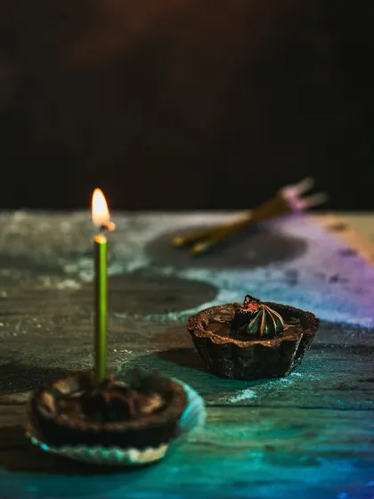 An alternate angle of the birthday tart scene, playing with rainbow light reflections.