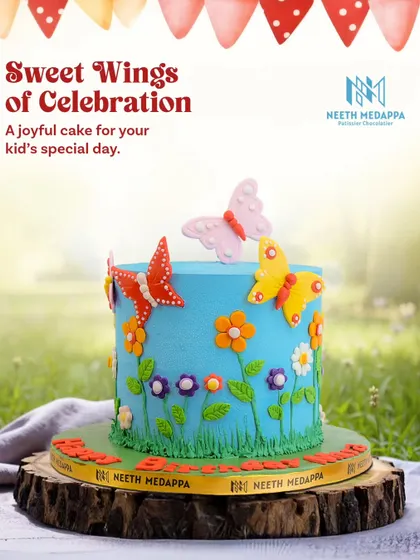 Sweet wings of celebration. This joyful cake is adorned with colorful butterflies and flowers, set against a bright blue sky.