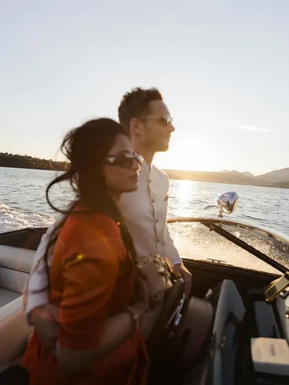 Sailing into the sunset on Lake Garda. This is the epitome of a cinematic destination wedding moment, combining romance with a breathtaking landscape.
