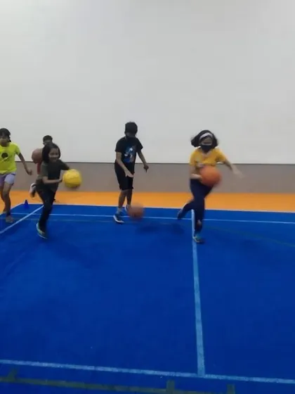 Dribbling drills in action! We teach ball control and agility through fun and repetitive exercises.