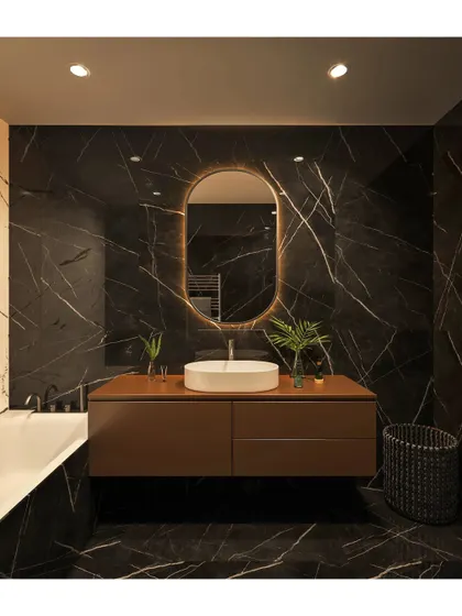 A modern bathroom that makes a bold statement. We used large-format black marble tiles with striking white veins, a floating wooden vanity, and a minimalist basin to create a look of pure, contemporary luxury.