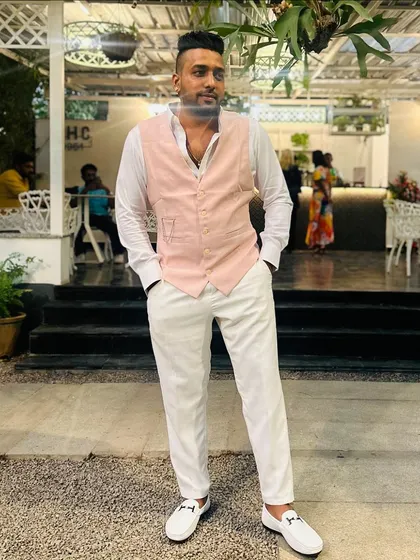 Dream big, hustle harder. That's the motto I live by. Dressed for a sophisticated evening event, always ready for the next opportunity.