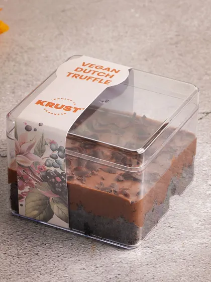 A closer look at the packaging for our Vegan Dutch Truffle. The beautiful label reflects the quality of the delicious plant-based dessert inside.
