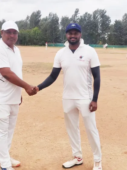 A handshake between captains, setting a positive tone for the match ahead.