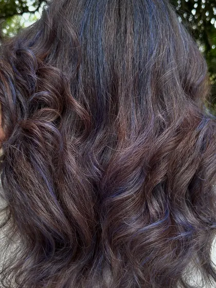Another close-up of the beautiful, subtle purple hues woven through her hair.