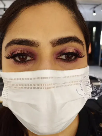 A beautiful pink and gold halo eye look, perfect for any wedding function, day or night. This technique helps the eyes appear larger and adds a shimmering glow and dimension to the face.