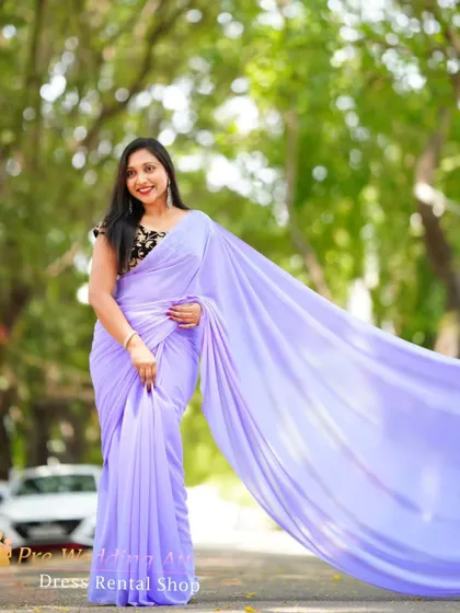 A full-length shot of the lavender trail saree.