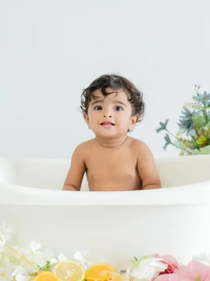 Rub-a-dub-dub, a cutie in the tub! This floral bath setup is another beautiful and fun option for a milestone session.