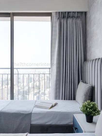 This kids' room may be compact, but it's filled with clever design solutions. I accommodated two single beds and a study area while maintaining a stylish and functional space.