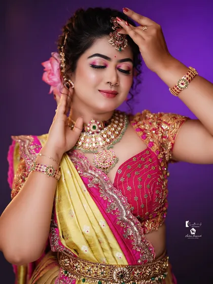 A beautiful three-quarter view highlighting the soft curls framing the face.