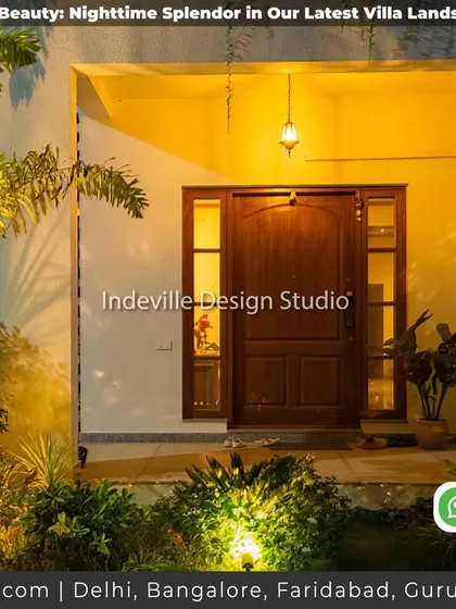 A duplicate image of the grand, illuminated front entrance of the villa.