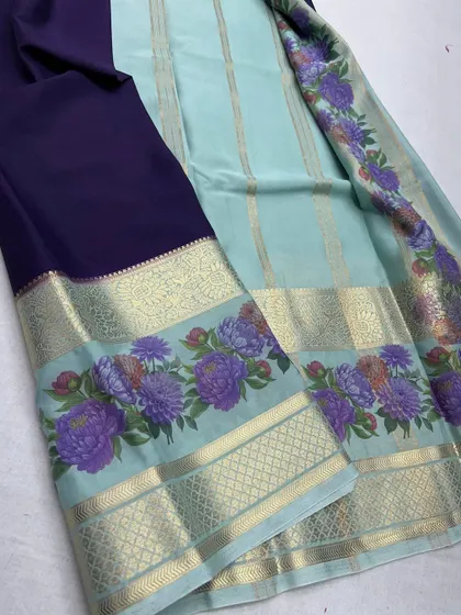 The sea green and purple semi-Mysore crepe saree, a trending design.