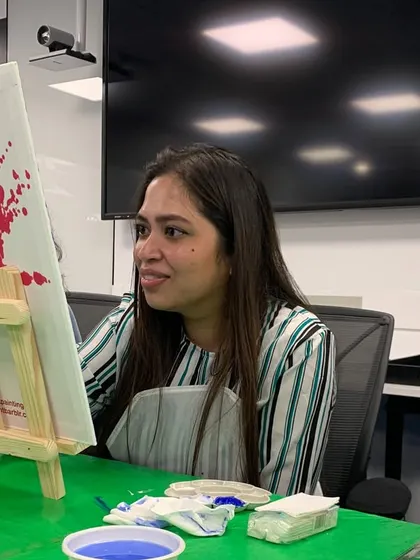 Another happy painter at the LinkedIn event. We believe everyone has a creative side, and my goal is to help you find it.