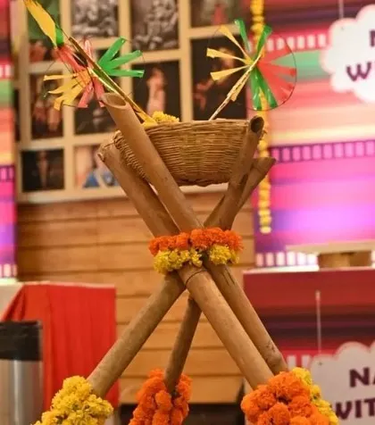 Even the food stations get a decorative touch. For this Haldi, I used bamboo stands and marigold flowers to create themed counters for snacks like nachos and crispy corn, integrating them into the overall decor.