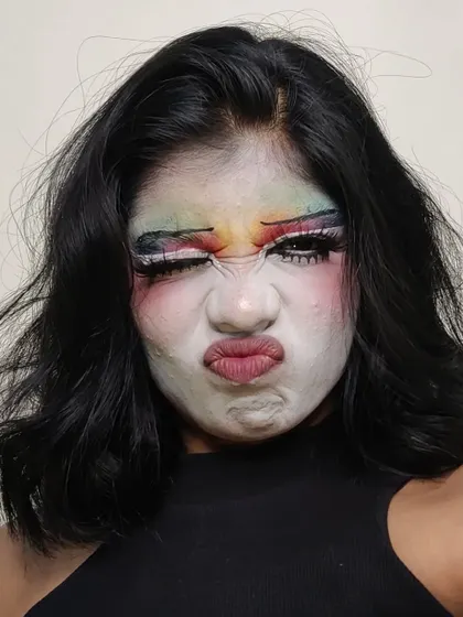 A fun, expressive shot of the clown makeup, showing how it moves with facial expressions.