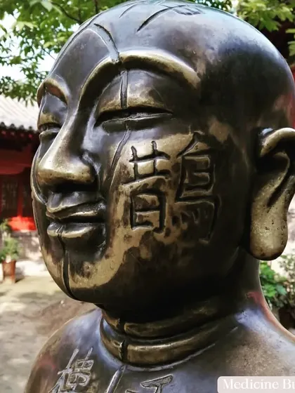 The Medicine Buddha statue at the healing center in the Songshan Shaolin Temple. This represents the healing and wellness aspects of our practice, which aim to balance both mind and body.
