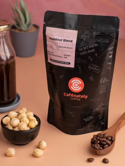 We created this styled product shot for Cafenately's Hazelnut Blend coffee, using raw ingredients to visually communicate the flavor profile and quality of the beans.