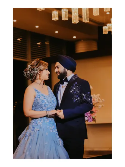 A romantic portrait of the couple sharing a quiet moment. The soft lighting and their loving gaze make this a perfect capture of their connection.