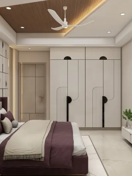 This angle shows the full-wall wardrobe with its unique, abstract black-and-white pattern, which is a running theme in the room's design.
